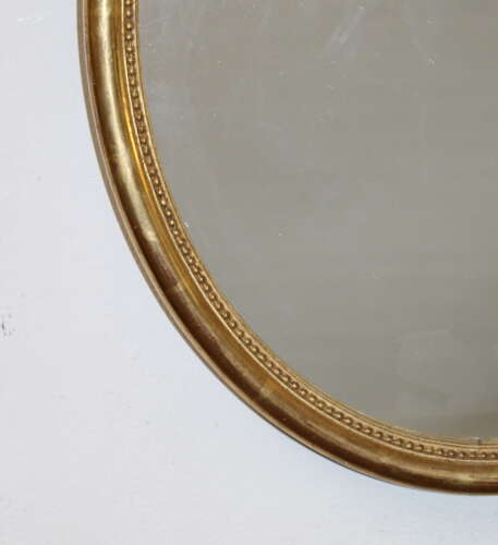 Antique French oval mirror with watergilt frame