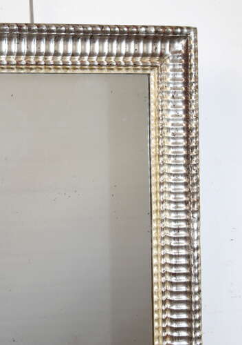 Antique French silverleafed rippled framed mirror