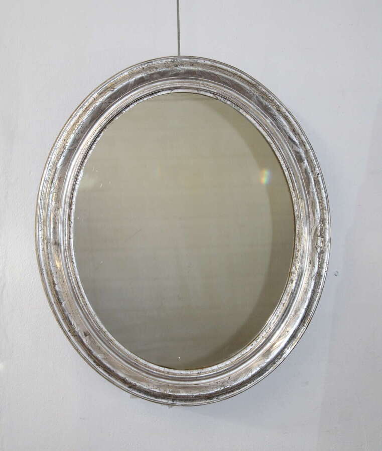Antique French silverleafed oval mirror