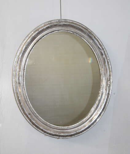 Antique French silverleafed oval mirror