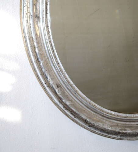 Antique French silverleafed oval mirror