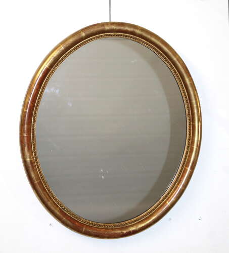 Antique French watergilt framed oval mirror