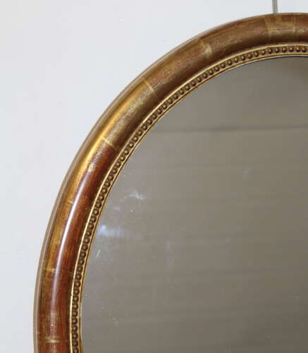 Antique French watergilt framed oval mirror