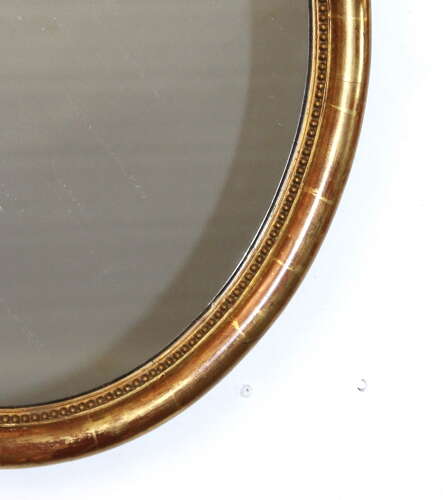 Antique French watergilt framed oval mirror