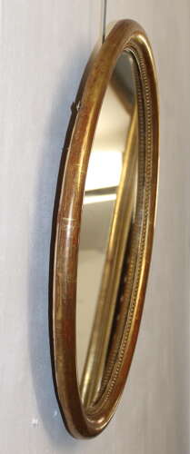 Antique French watergilt framed oval mirror