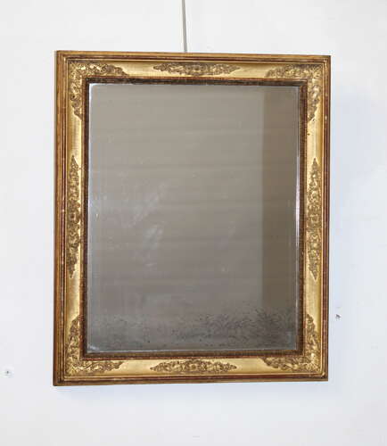 Small antique French gilt mirror with decorative frame