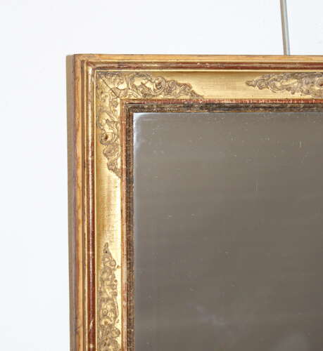 Small antique French gilt mirror with decorative frame