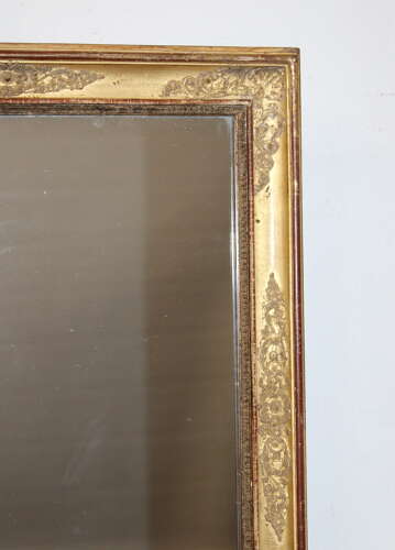 Small antique French gilt mirror with decorative frame