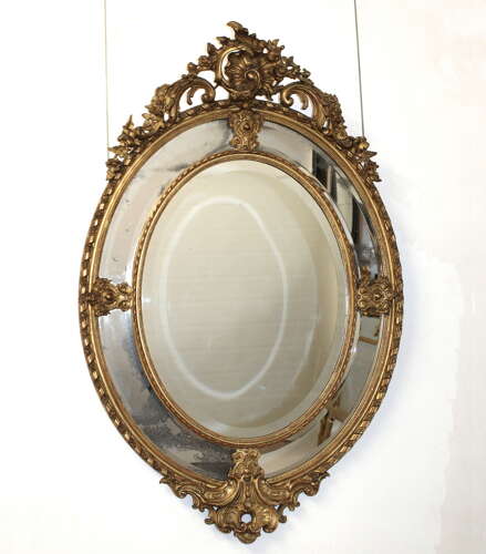 Decorative antique French margin oval mirror