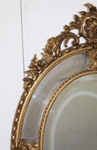 Decorative antique French margin oval mirror
