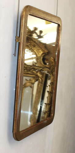 Exquisite Antique French etched gilt mirror with curved corners