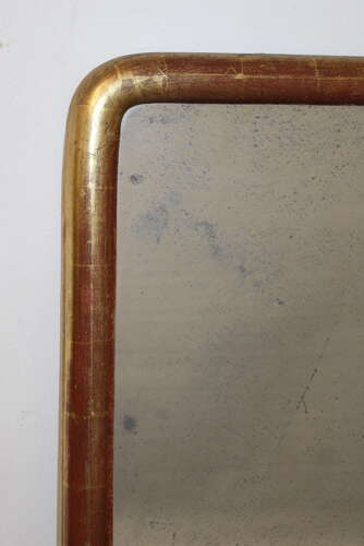 Narrow antique French archtop mirror with watergilt frame