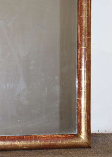 Narrow antique French archtop mirror with watergilt frame