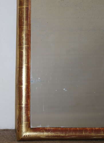 Narrow antique French archtop mirror with watergilt frame
