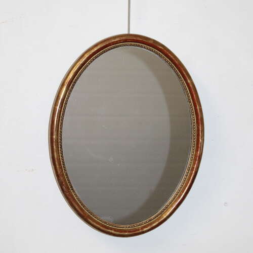 Antique French oval mirror with narrow watergilt frame
