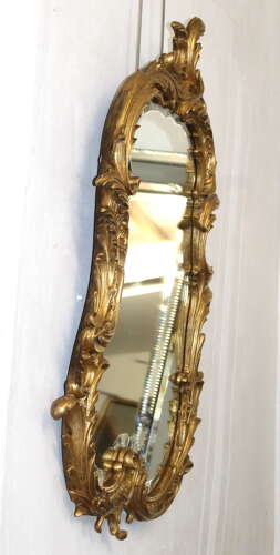 Antique French rococo mirror with bevelled glass