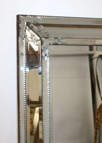Exceptional antique cushioned mercury glass Venetian mirror