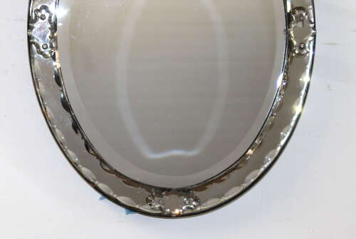 Antique oval Venetian mirror with bow