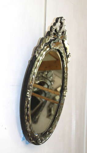 Antique oval Venetian mirror with bow