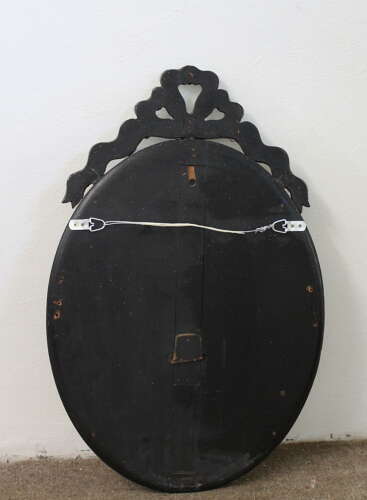 Antique oval Venetian mirror with bow