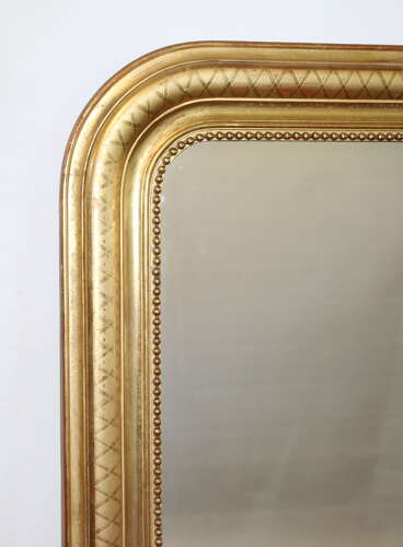 Antique French archtop mirror with etched criss-cross frame