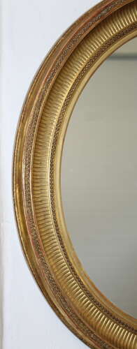 Handsome pair of large antique French oval mirrors