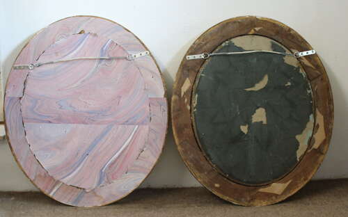 Handsome pair of large antique French oval mirrors