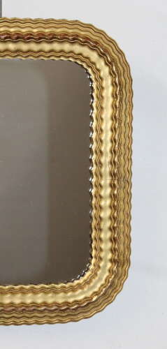Small antique French mirror with rippled gilt frame