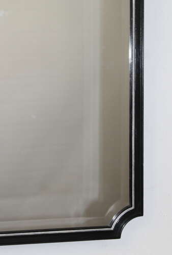 Bevelled 1940s mirror with ebonised and silverleafed frame