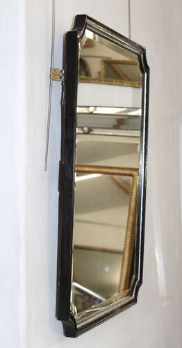 Bevelled 1940s mirror with ebonised and silverleafed frame