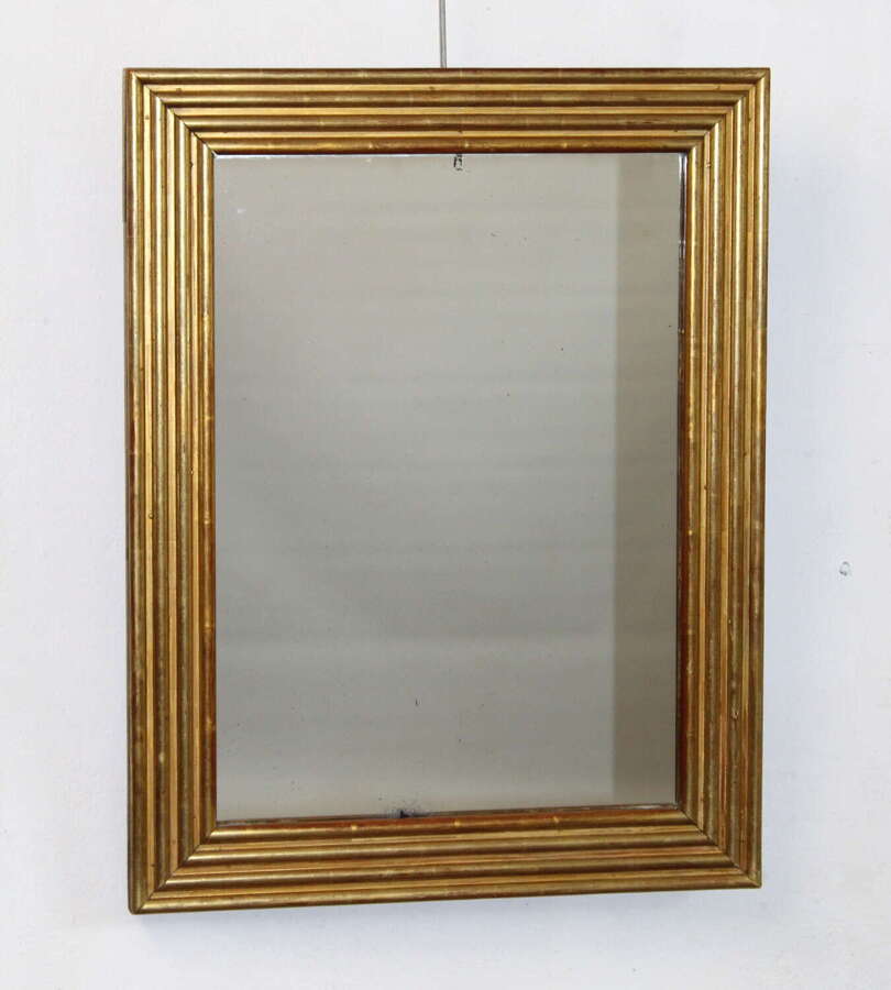 Compact antique French gilt reeded mirror with mercury glass
