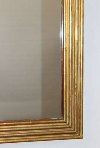 Compact antique French gilt reeded mirror with mercury glass