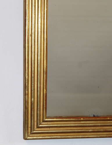 Compact antique French gilt reeded mirror with mercury glass