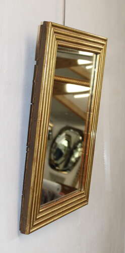 Compact antique French gilt reeded mirror with mercury glass
