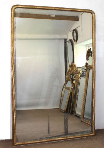 Huge antique French gilt archtop mirror with mercury glass