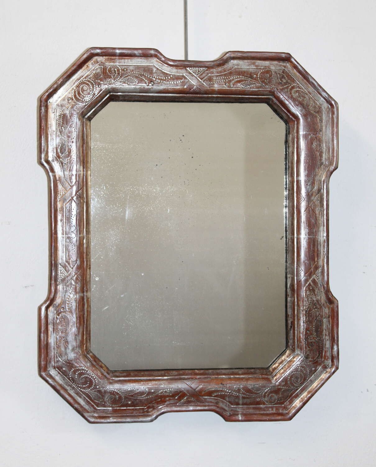 Small antique Italian mirror with outset corners