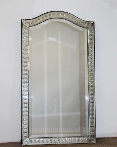 Elegant narrow antique Venetian mirror with serpentine top