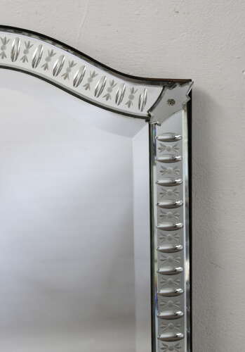 Elegant narrow antique Venetian mirror with serpentine top