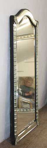 Elegant narrow antique Venetian mirror with serpentine top