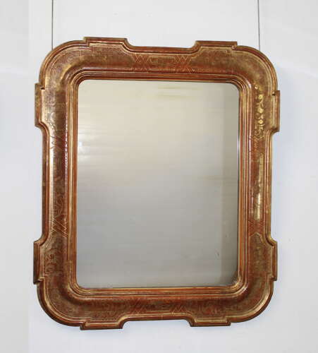 Large antique Italian mirror with outset corners