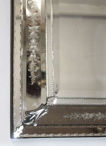 Antique Venetian mirror with exquisitely etched frame