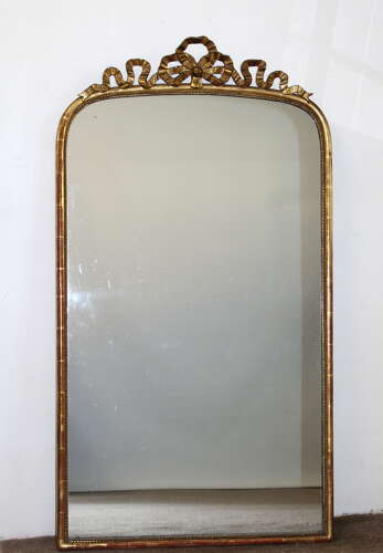 Antique French arched mirror with bow cartouche