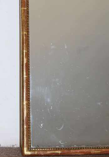 Antique French arched mirror with bow cartouche