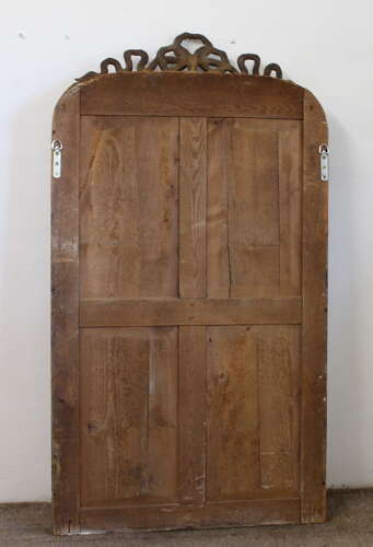 Antique French arched mirror with bow cartouche